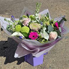 Florist Choice Hand Tied in Lilac Hatbox